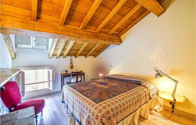 Letto o letti in una camera di 4 Bedroom Cozy Apartment In Mantova