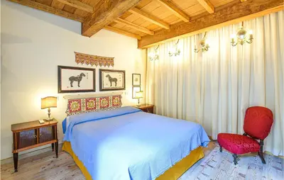Letto o letti in una camera di 4 Bedroom Cozy Apartment In Mantova