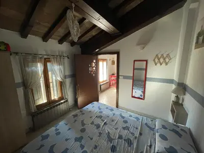 Letto o letti in una camera di Independent Little Loft in Modena