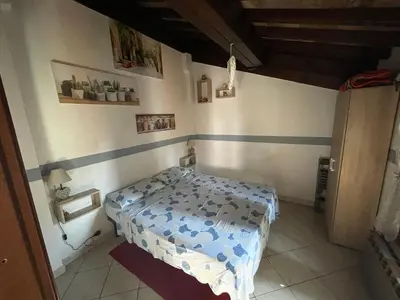 Letto o letti in una camera di Independent Little Loft in Modena