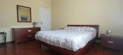 Letto o letti in una camera di Appartamento due camere Castellarano Sassuolo