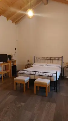 Letto o letti in una camera di Agriturismo Pizzavacca