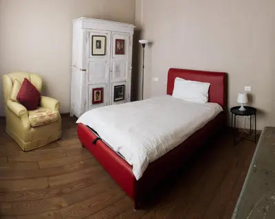 Letto o letti in una camera di Casale Hortensia