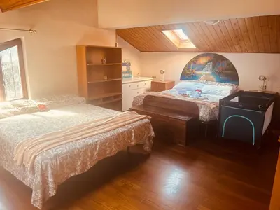 Letto o letti in una camera di PERLA Bianca DELLE 5 TERRE