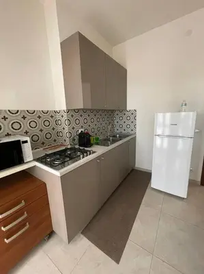 Cucina o angolo cottura di TERRACE HOUSE appartamento mq 80 adiacente ospedale e clinica