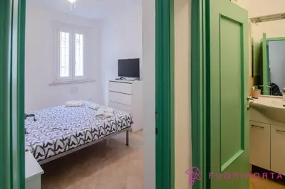 Letto o letti in una camera di FuoriPorta Affitti Brevi - Borgo Cocconi 33