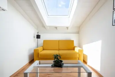 Area soggiorno di Domus: modern Loft in the center of Parma