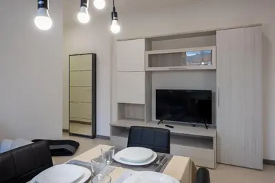 TV o dispositivi per l'intrattenimento presso GuestHost - Santo Stefano di Magra Modern Apartments