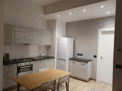 Cucina o angolo cottura di Seafront Riva appartamento fronte mare