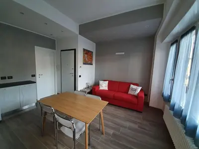 Area soggiorno di Seafront Riva appartamento fronte mare