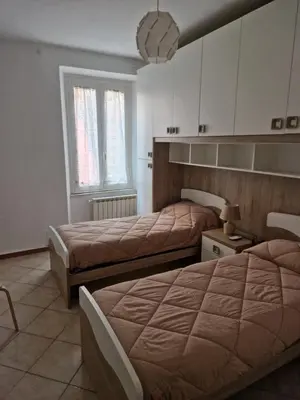 Letto o letti in una camera di La Casa sull'argine