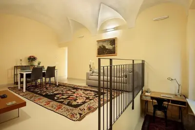 Letto o letti in una camera di CHARMING APARTMENT IN PARMA/ TEATRO REGIO / WIFI
