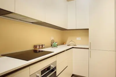 Cucina o angolo cottura di CHARMING APARTMENT IN PARMA/ TEATRO REGIO / WIFI
