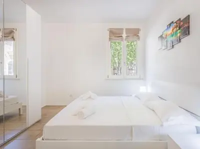Letto o letti in una camera di Nour Apartments - Castramajora Alloggi