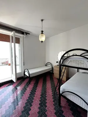 Letto o letti in una camera di Sunflower terrazza panoramica