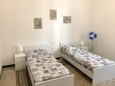 Letto o letti in una camera di Oliver sulla via del mare