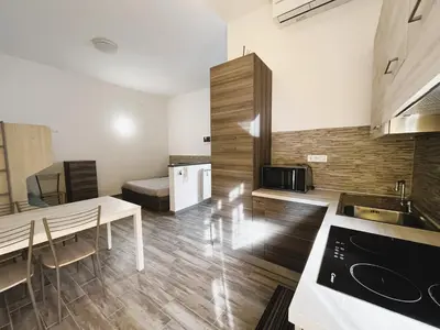 Cucina o angolo cottura di Monolocale con posto auto