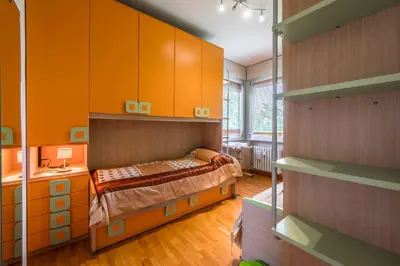 Letto o letti in una camera di Appartamento a Modena, comodo a tutti i servizi