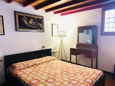 Letto o letti in una camera di Dante Appartamento con giardino
