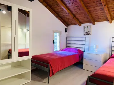 Letto o letti in una camera di Dante Appartamento con giardino