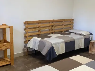 Letto o letti in una camera di Il Golfarone