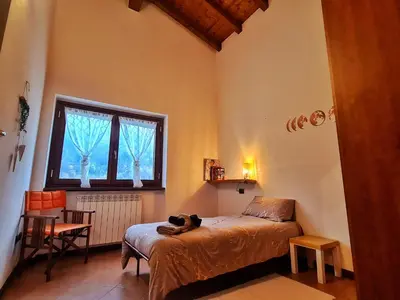 Letto o letti in una camera di Il Posticino D'oltrepò
