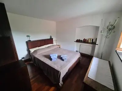 Letto o letti in una camera di Castrusso il Frantoio di Rapallo by PortofinoVacanze
