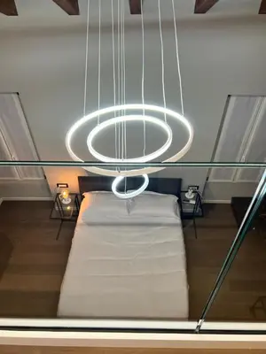 Letto o letti in una camera di V&B Suites and Apartments