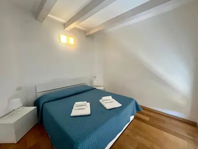 Letto o letti in una camera di Appartamento Margherita Residenza Prealba