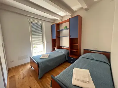 Letto o letti in una camera di Appartamento Margherita Residenza Prealba