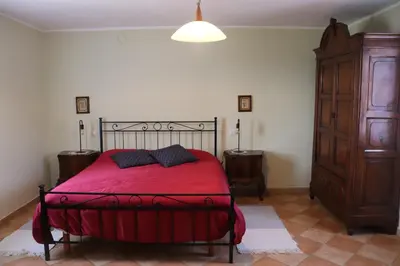 Letto o letti in una camera di Cascina Angelina