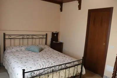 Letto o letti in una camera di Cascina Angelina