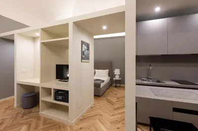 Letto o letti in una camera di Palazzo Liberati Apartments - Manu Maison
