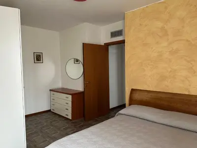 Letto o letti in una camera di Intero appartamento Parma Fiere
