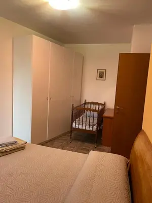 Letto o letti in una camera di Intero appartamento Parma Fiere