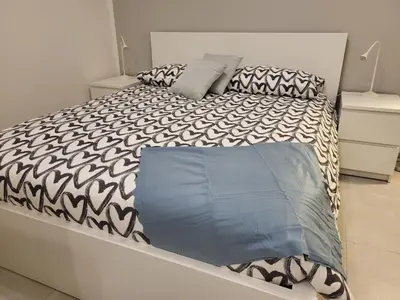 Letto o letti in una camera di Rifugio in città