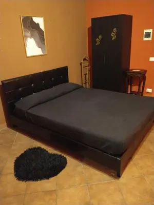 Letto o letti in una camera di Merope Idrosuite