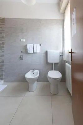 Bagno di FARE BnB - Room Pappagnocca