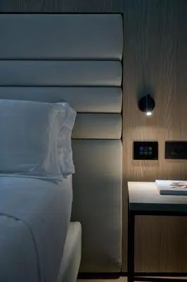Letto o letti in una camera di RMH Modena Raffaello