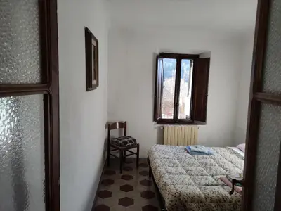 Letto o letti in una camera di Il ristoro del viandante
