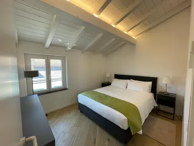 Letto o letti in una camera di SUN Luxury Apartment in Centro Storico