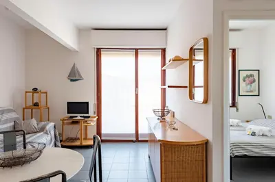 Letto o letti in una camera di JOIVY Cosy flat with terrace near Rapallo Castle