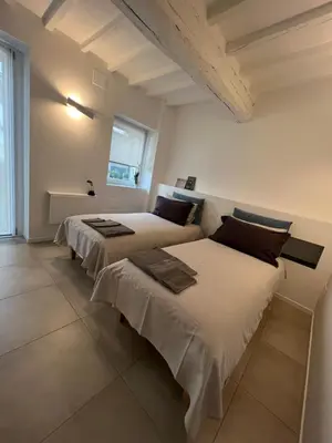 Letto o letti in una camera di CasaDea