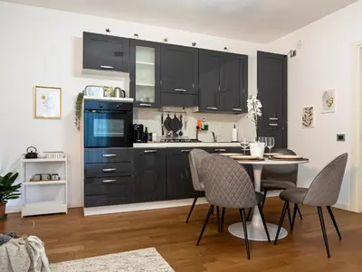 Cucina o angolo cottura di Maison Blanche: appartamento elegante con parcheggio privato