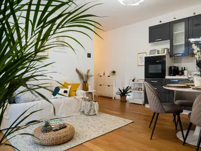Cucina o angolo cottura di Maison Blanche: appartamento elegante con parcheggio privato