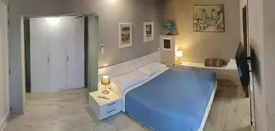 Letto o letti in una camera di Affittacamere ADELPHIA