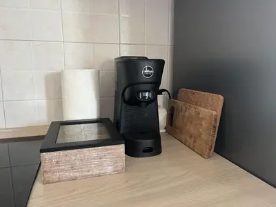 Set per la preparazione di tè e caffè presso Lovely Apartment