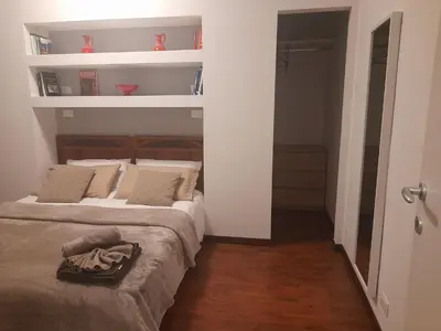 Letto o letti in una camera di Domus Flavia