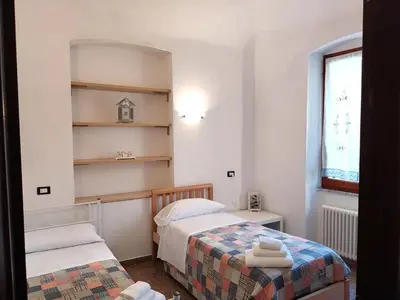 Letto o letti in una camera di Casa Augusto with seaview