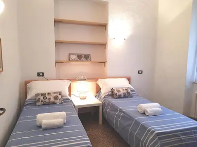 Letto o letti in una camera di Casa Augusto with seaview